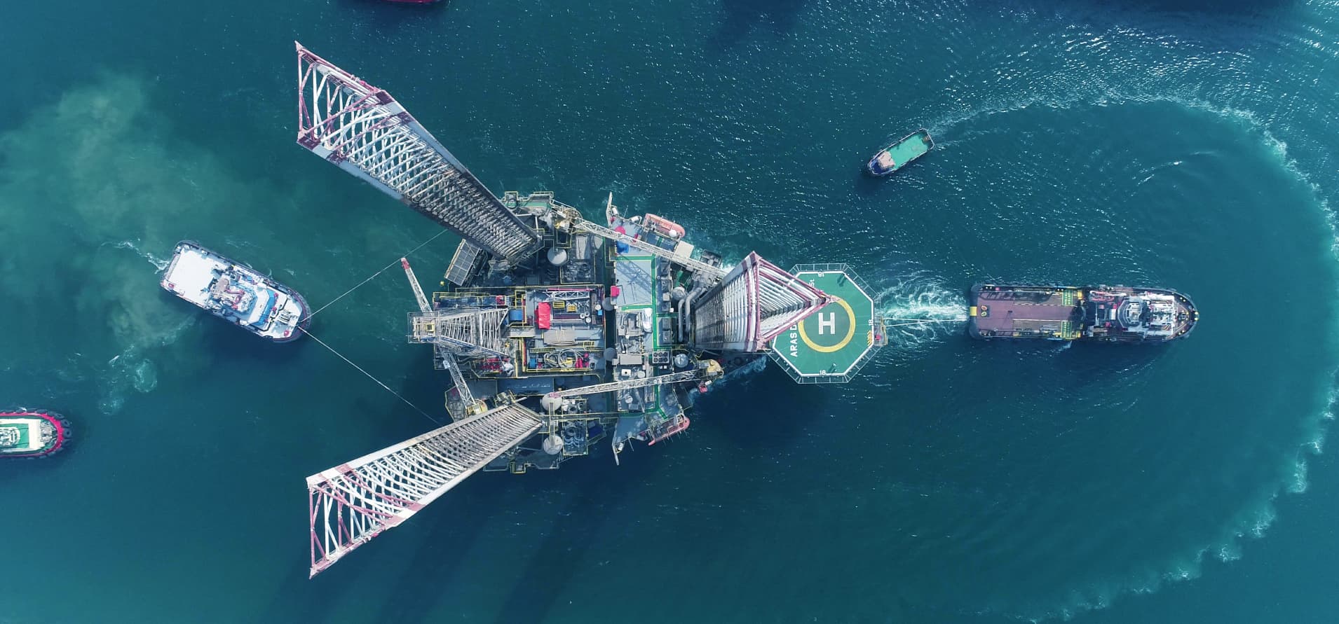 Aerial view of offshore jack-up drilling rig operating in Qatari waters